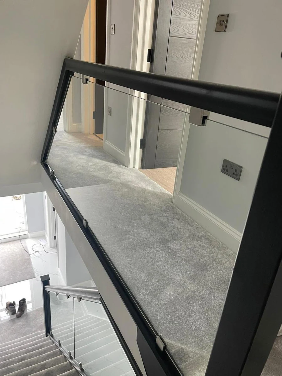 staircase-glass-balustrade-double-height-landing-reigate-reigate-glass-balustrades Glass balustrade on double-height landing staircase in Reigate residential property