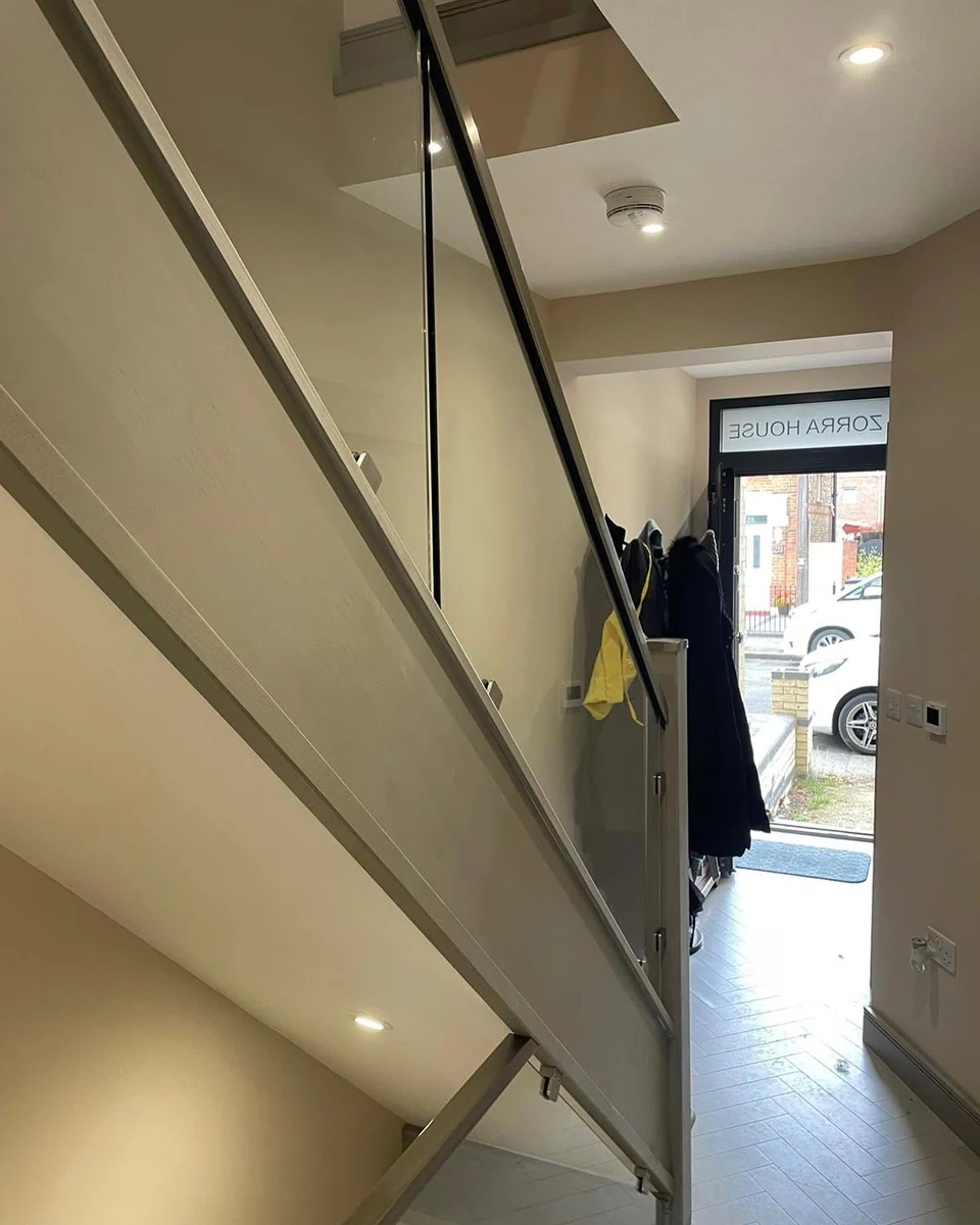 staircase-glass-balustrade-hallway-entry-stair-reigate-reigate-glass-balustrades Glass balustrade on hallway entry staircase, Reigate Glass Balustrades installation