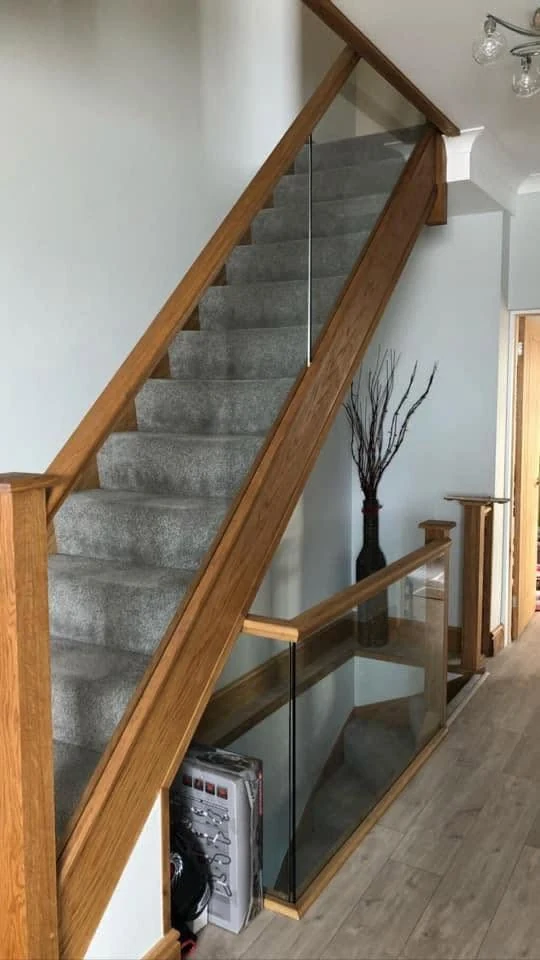 staircase-glass-balustrade-oak-frame-hallway-reigate-reigate-glass-balustrades Glass balustrade with oak frame in hallway staircase, Reigate Glass Balustrades